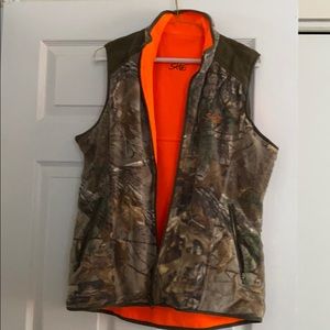 Women’s SHE reversible vest.
